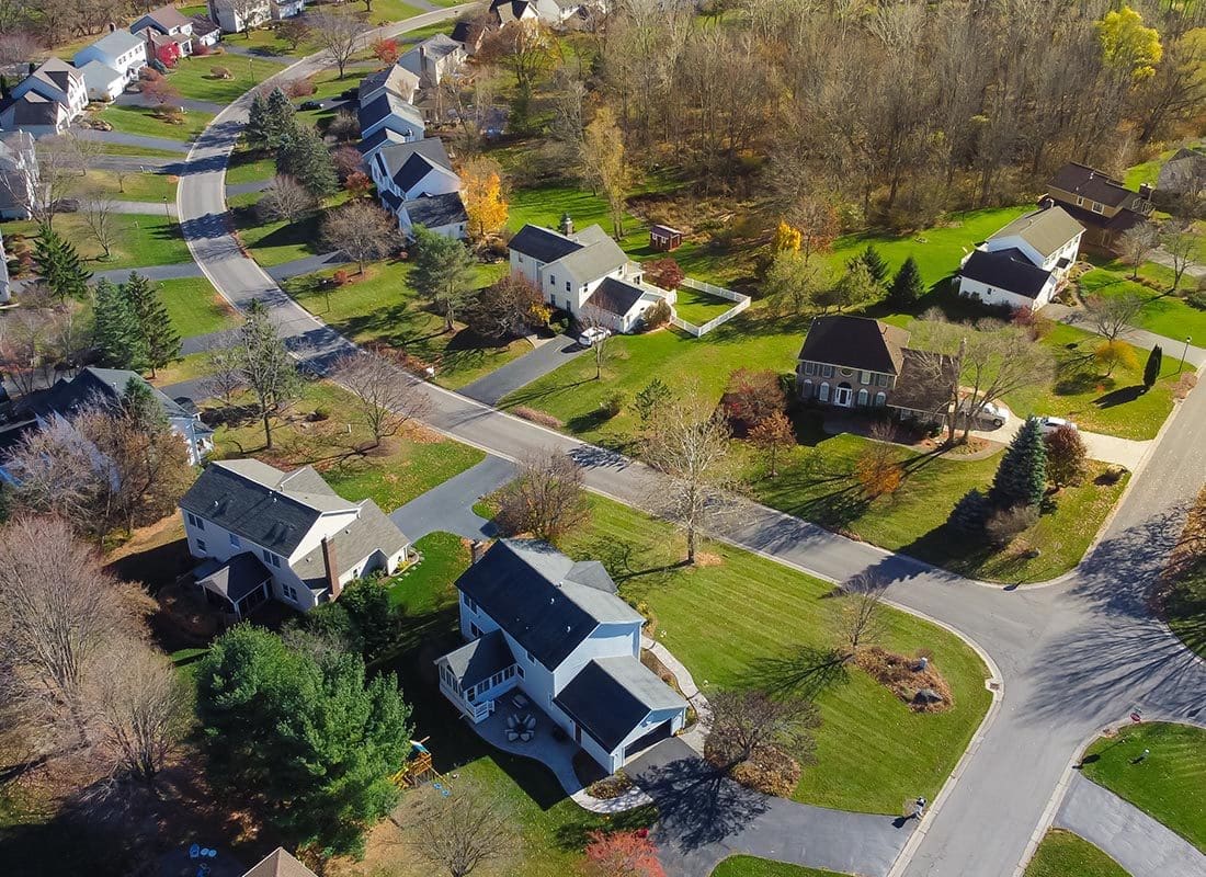 Inlet, NY - Aerial View of New York Homes on a Sunny Day